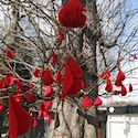 Crystal Palace Park yarnbombed with knitted drops of blood