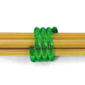 Coil knitting needle holder